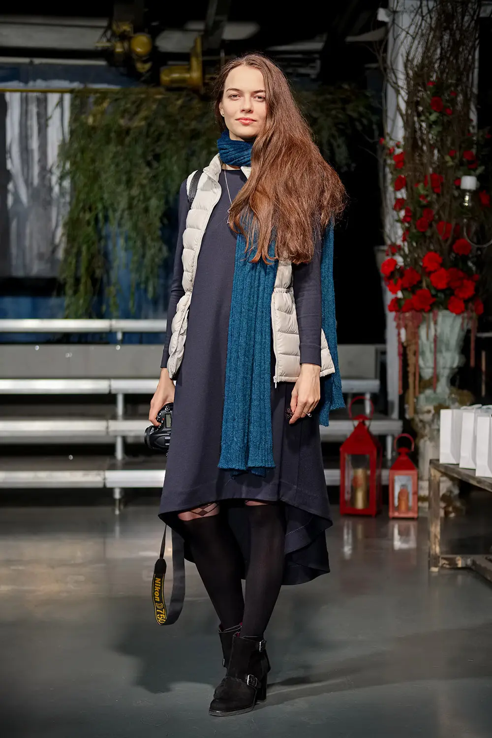 Fashion blogger with camera on stage